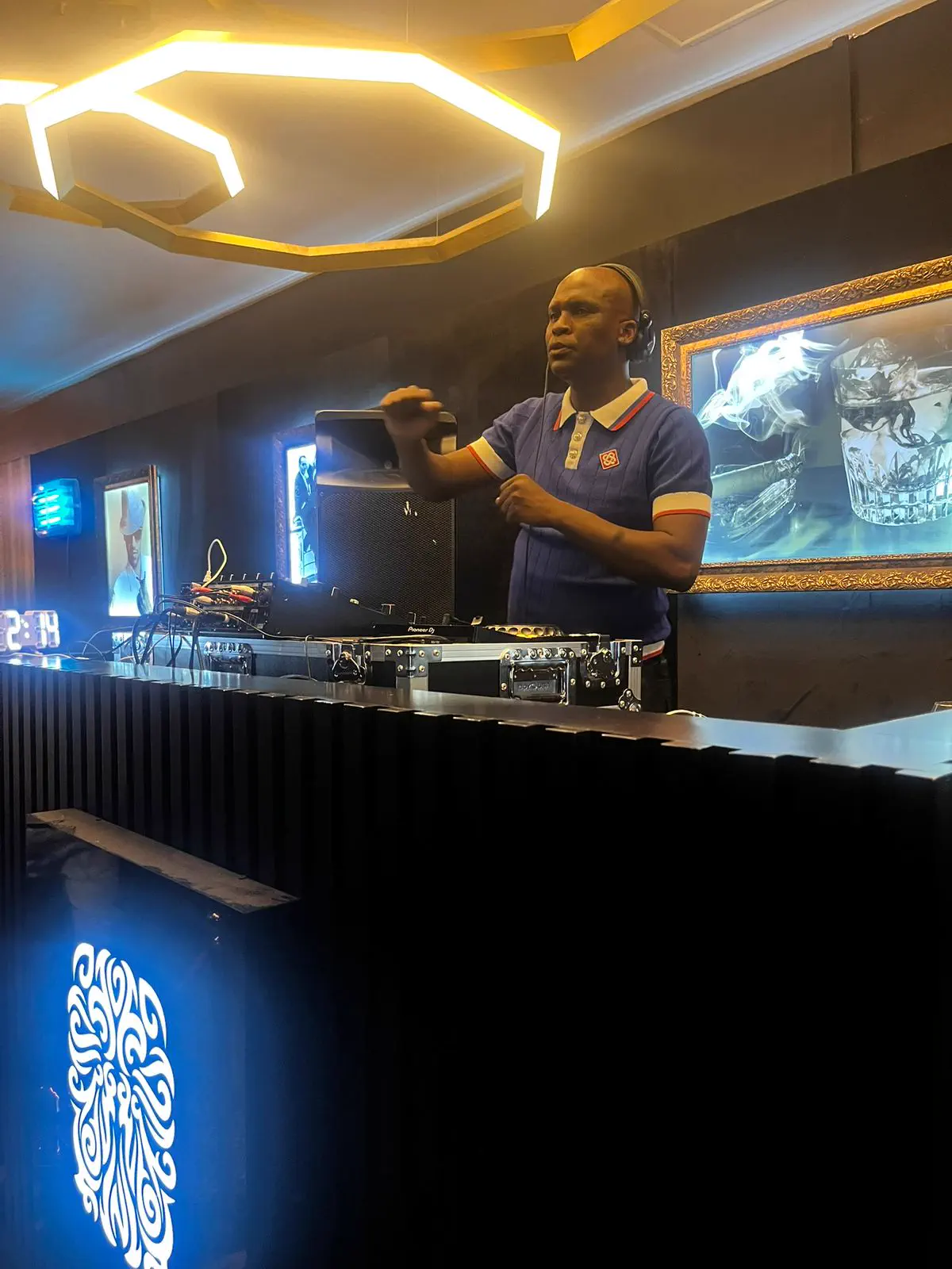 DJ Black Jesus commanding the stage at a South African show